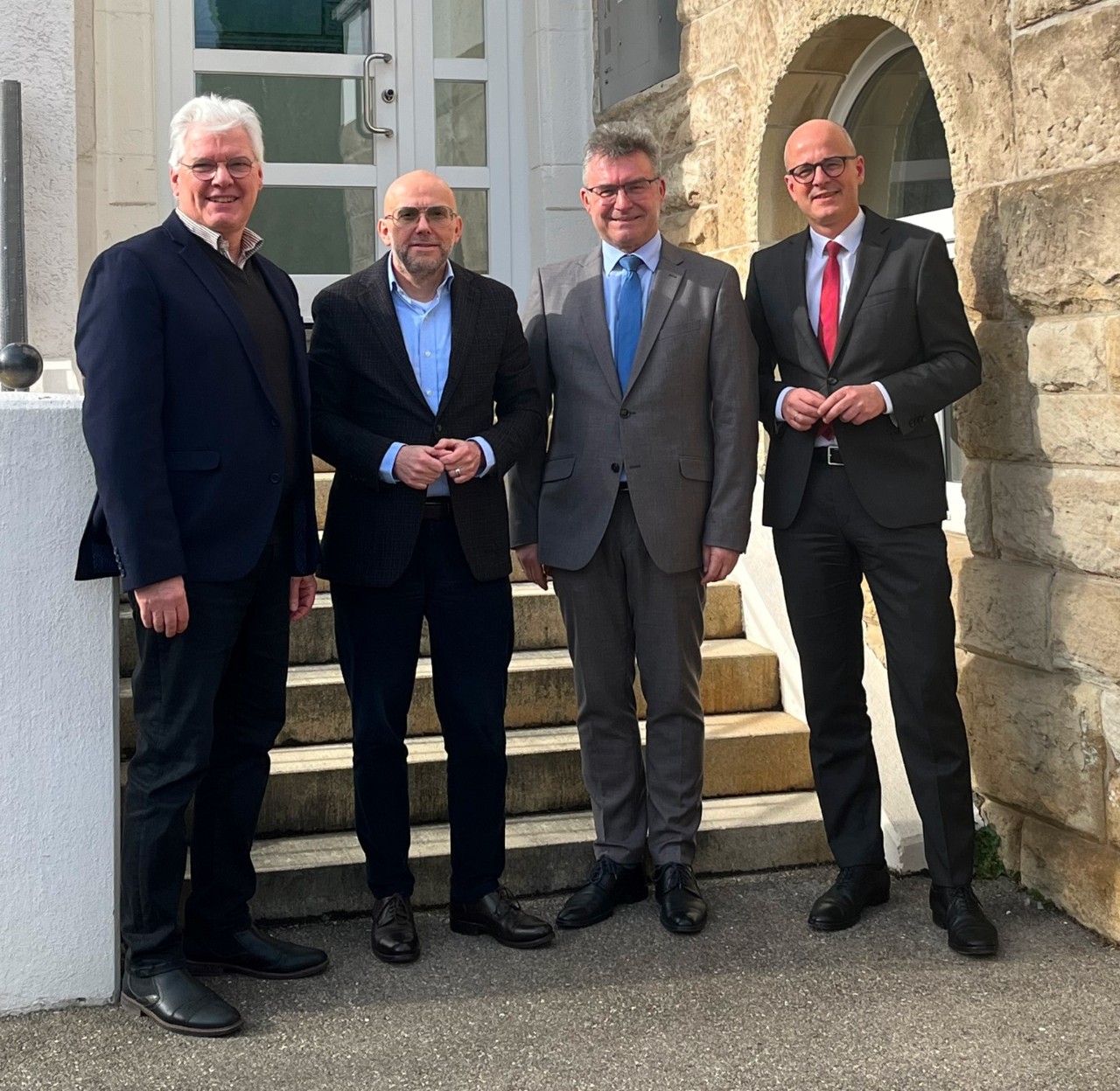 vdek am 23.2.26 beim Landkreistag. 4 Männer in der Gruppe stehend