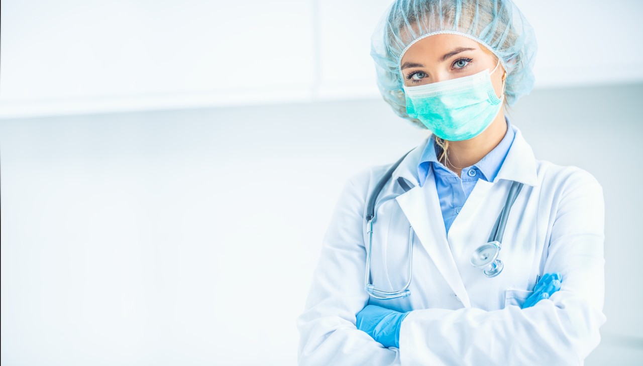 Portrait of doctor woman surgeon specialist in sterile clothing Portrait of doctor woman surgeon specialist in sterile clothing