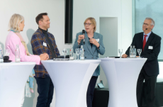 Podium mit 4 Personen
